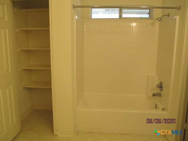 103 Evan Circle Victoria, TX 77901 - Photo 19 of 22 a bathroom with a shower