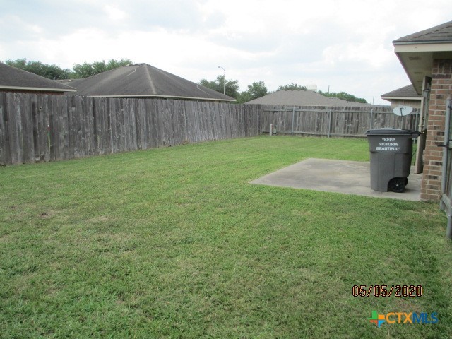 103 Evan Circle Victoria, TX 77901 - Photo 22 of 22 a view of a backyard with a tub