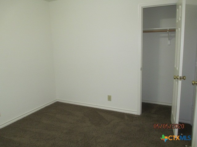 103 Evan Circle Victoria, TX 77901 - Photo 8 of 22 an empty room with a bench
