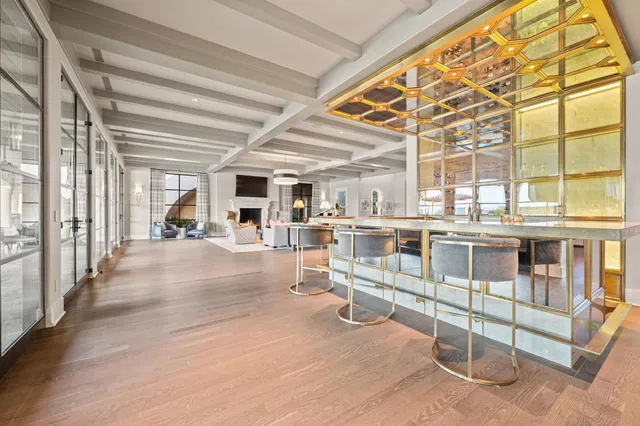 a view of a living room and entry way