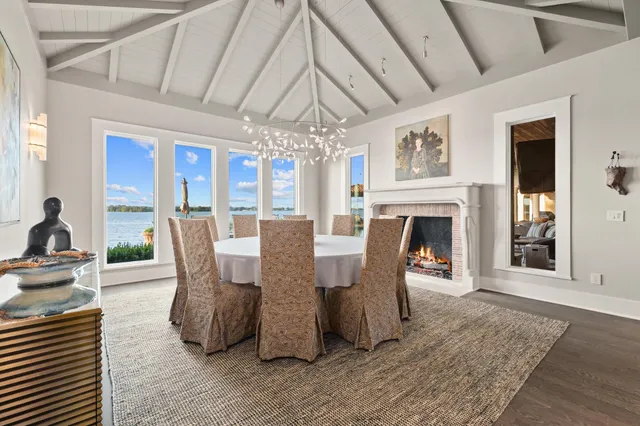 a living room with furniture fireplace and window