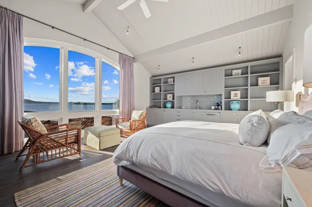 a view of a house with a patio and balcony