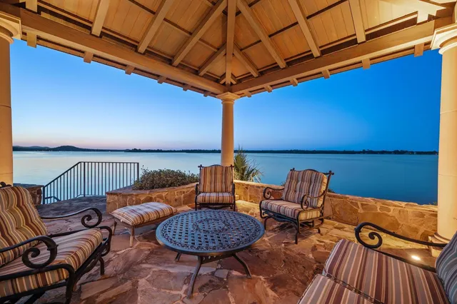 a outdoor living space with furniture and rug