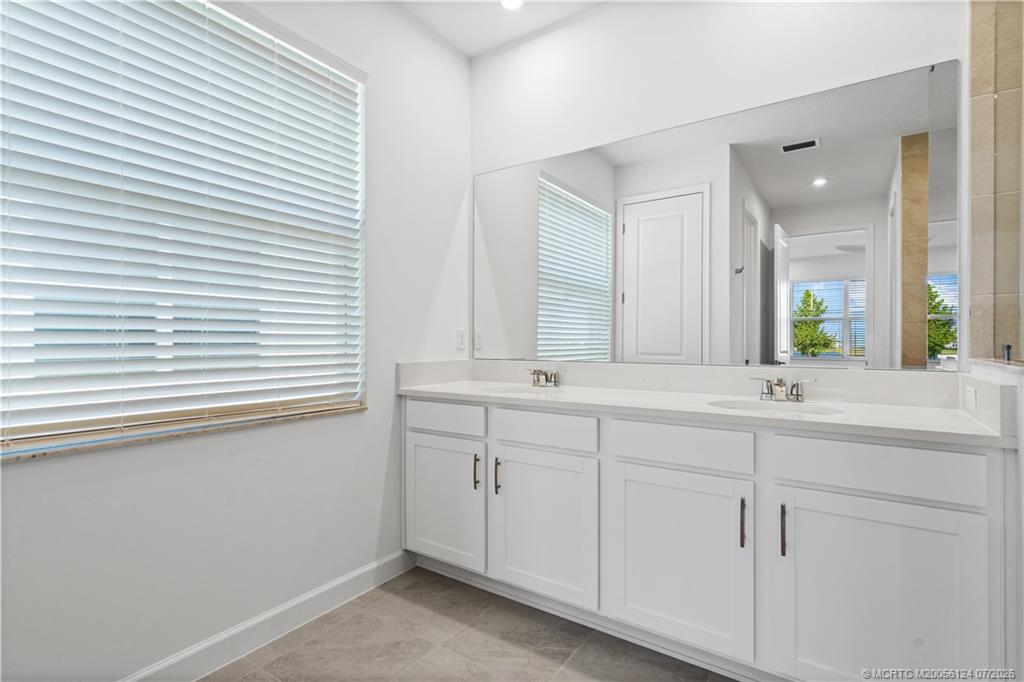 9731 Southwest Indra Way Port St. Lucie, FL 34987 - Photo 17 of 33 Primary Bath