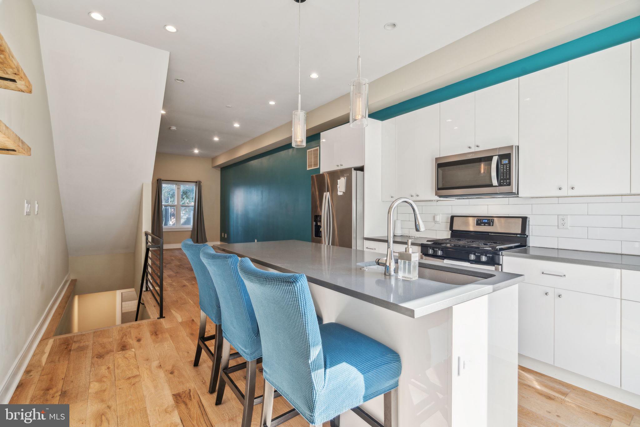 518 Mercy Street Philadelphia, PA 19148 - Photo 38 of 50 Modern kitchen with vibrant accents.