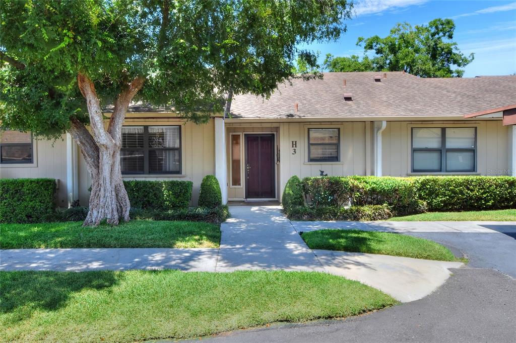 front view of house with a yard