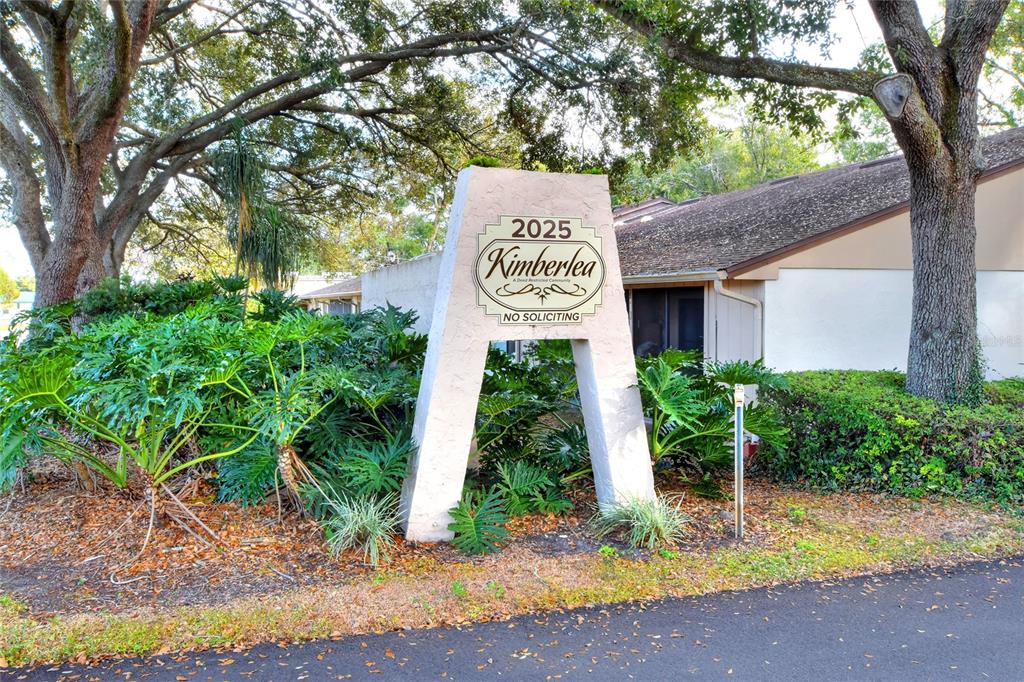 2025 Sylvester Road, Unit H3 Lakeland, FL 33803 - Photo 2 of 49 a sign board with a tree in front of it