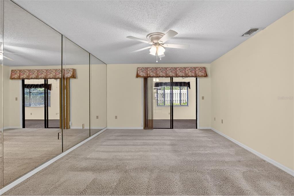 2025 Sylvester Road, Unit H3 Lakeland, FL 33803 - Photo 21 of 49 a view of an empty room with a window