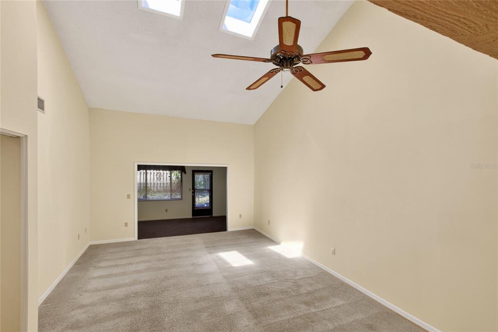 2025 Sylvester Road, Unit H3 Lakeland, FL 33803 - Photo 9 of 49 a view of empty room with windows