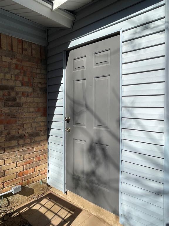 3543 Terrell Street Dallas, TX 75223 - Photo 24 of 26 a view of a wooden door