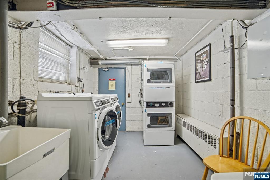 2430 8th Street, Unit 5B Fort Lee, NJ 07024 - Photo 16 of 20 a utility room with dryer and washer