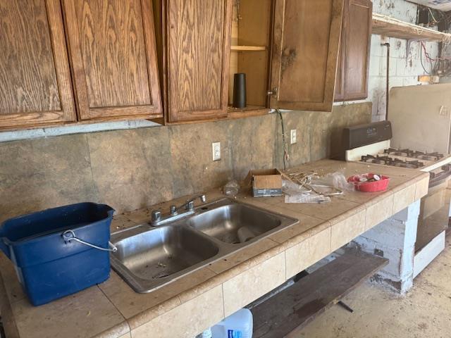 105 Silverline Road Morgan Hill, CA 95037 - Photo 28 of 34 a kitchen with a sink and cabinets