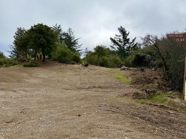 105 Silverline Road Morgan Hill, CA 95037 - Photo 3 of 34 a view of a dirt road with trees in the background
