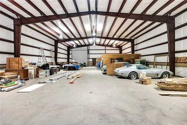 a view of parking garage with cars