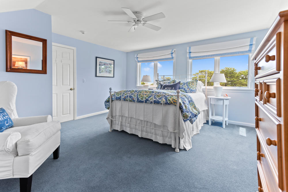 42 Gosnold Road Orleans, MA 02653 - Photo 28 of 42 a bed room with a bed and a couch