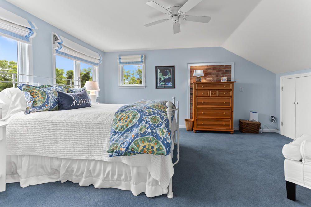 42 Gosnold Road Orleans, MA 02653 - Photo 29 of 42 a living room with furniture and a window