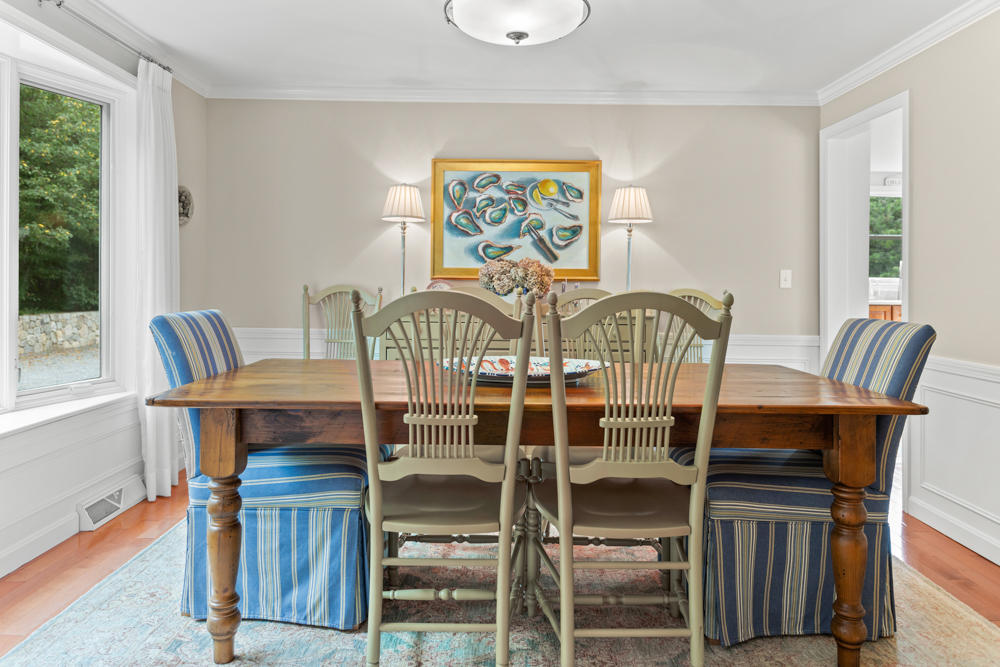 42 Gosnold Road Orleans, MA 02653 - Photo 9 of 42 a view of a dining room with furniture window and wooden floor