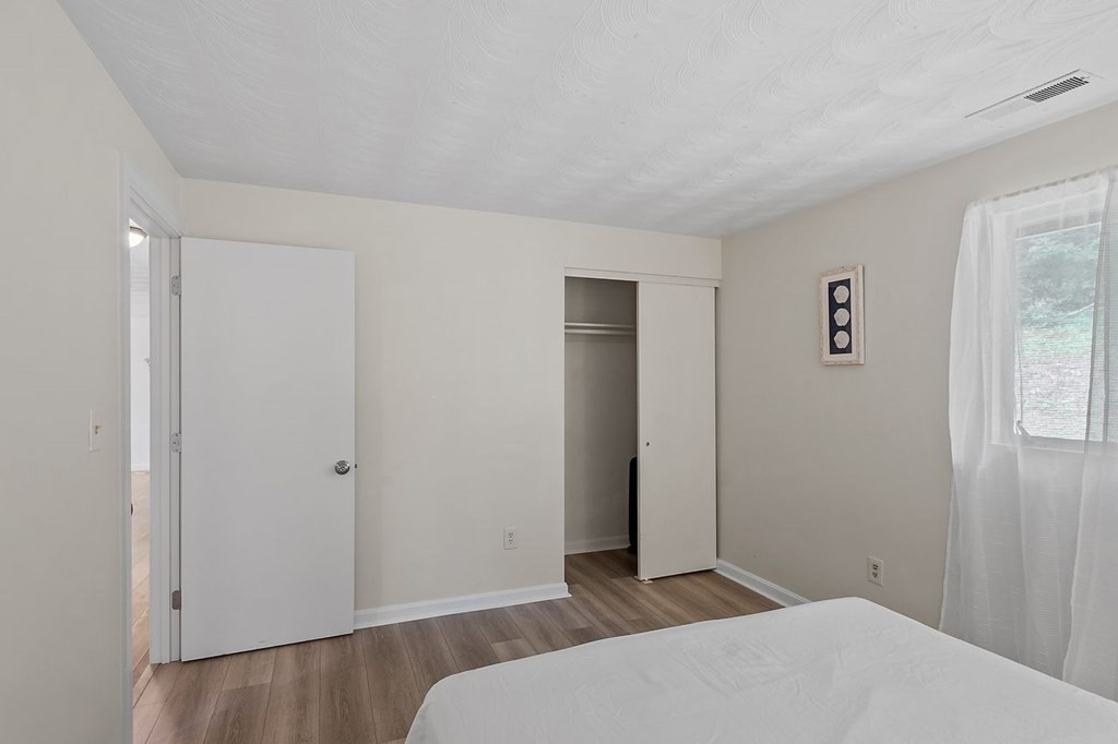 24 Algonquin Road Chelmsford, MA 01824 - Photo 18 of 38 a bedroom with a bed and a window