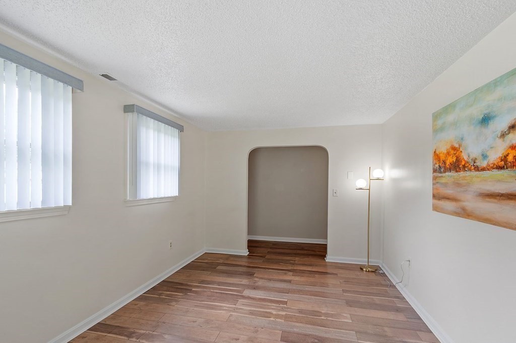 24 Algonquin Road Chelmsford, MA 01824 - Photo 29 of 38 an empty room with window and wooden floor