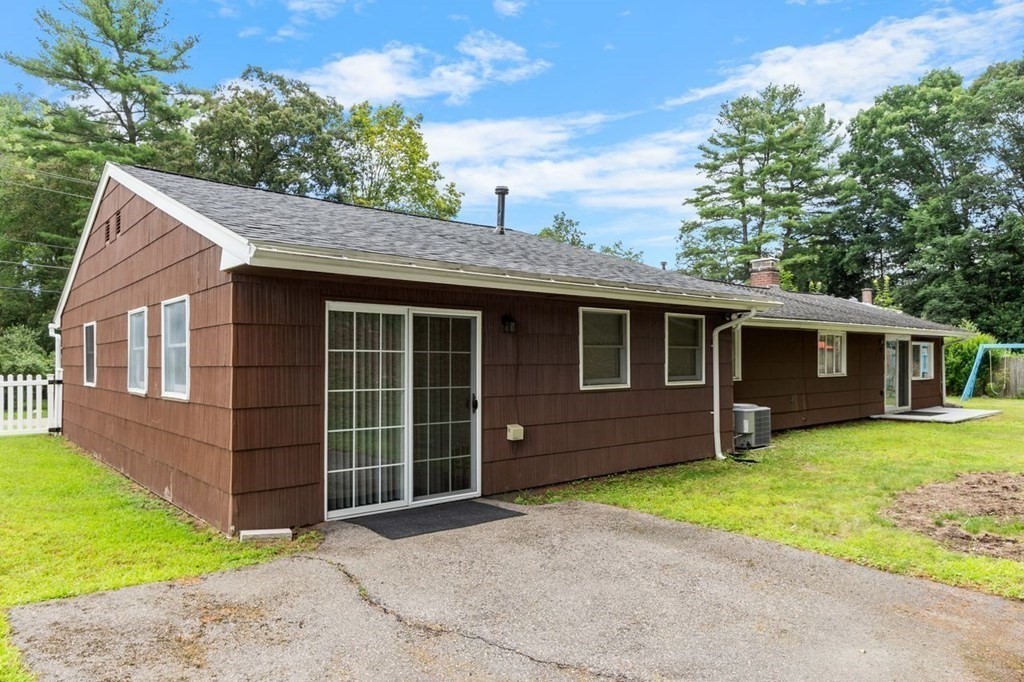 24 Algonquin Road Chelmsford, MA 01824 - Photo 31 of 38 a front view of a house with garden