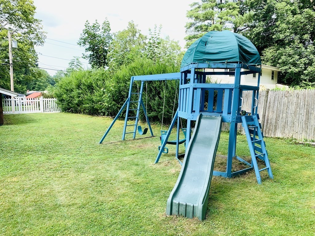 24 Algonquin Road Chelmsford, MA 01824 - Photo 38 of 38 a view of a backyard with a slide