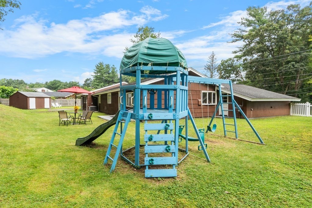 24 Algonquin Road Chelmsford, MA 01824 - Photo 4 of 38 a view of a house with a park