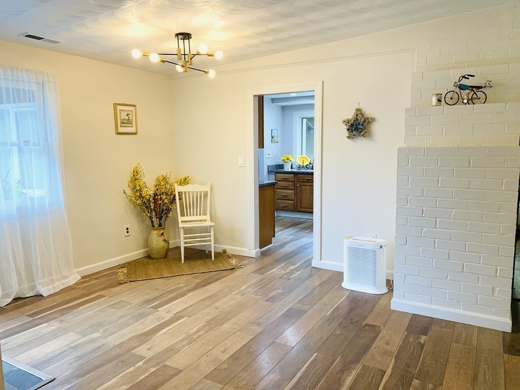 24 Algonquin Road Chelmsford, MA 01824 - Photo 8 of 38 a view of a room with wooden floor and bathroom