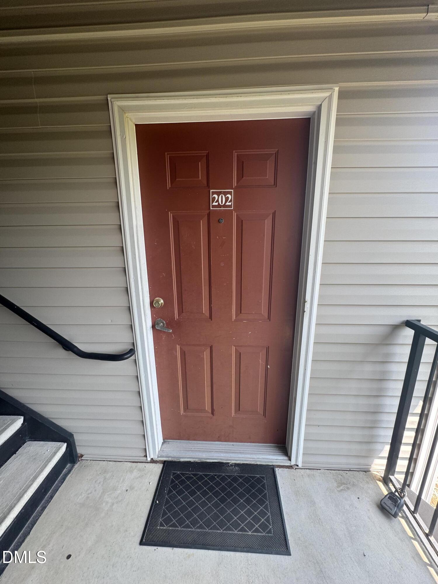 2520 Friedland Place, Unit 202 Raleigh, NC 27617 - Photo 2 of 14 a view of a entryway door of the house