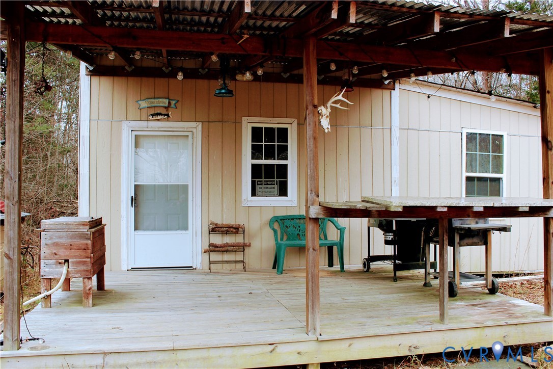 0 Cartersville Road New Canton, VA 23123 - Photo 11 of 49 a view of a patio with a table and chairs