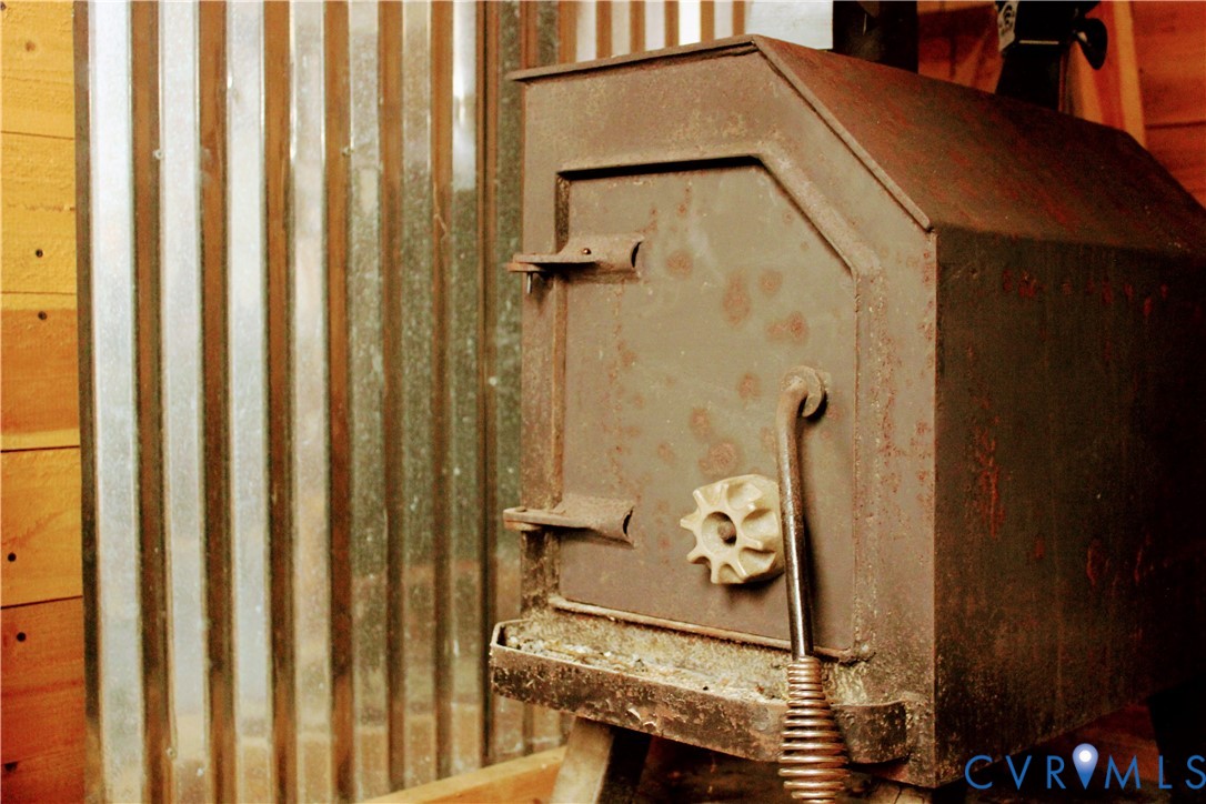 0 Cartersville Road New Canton, VA 23123 - Photo 46 of 49 a bathroom with a granite countertop sink and a mirror