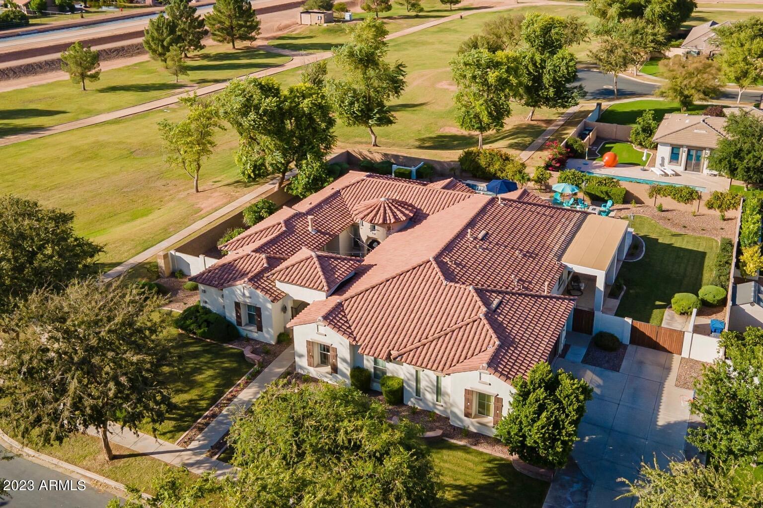 2820 Page Court Gilbert, AZ 85234 - Photo 99 of 109 an aerial view of a house with a yard basket ball court and outdoor seating