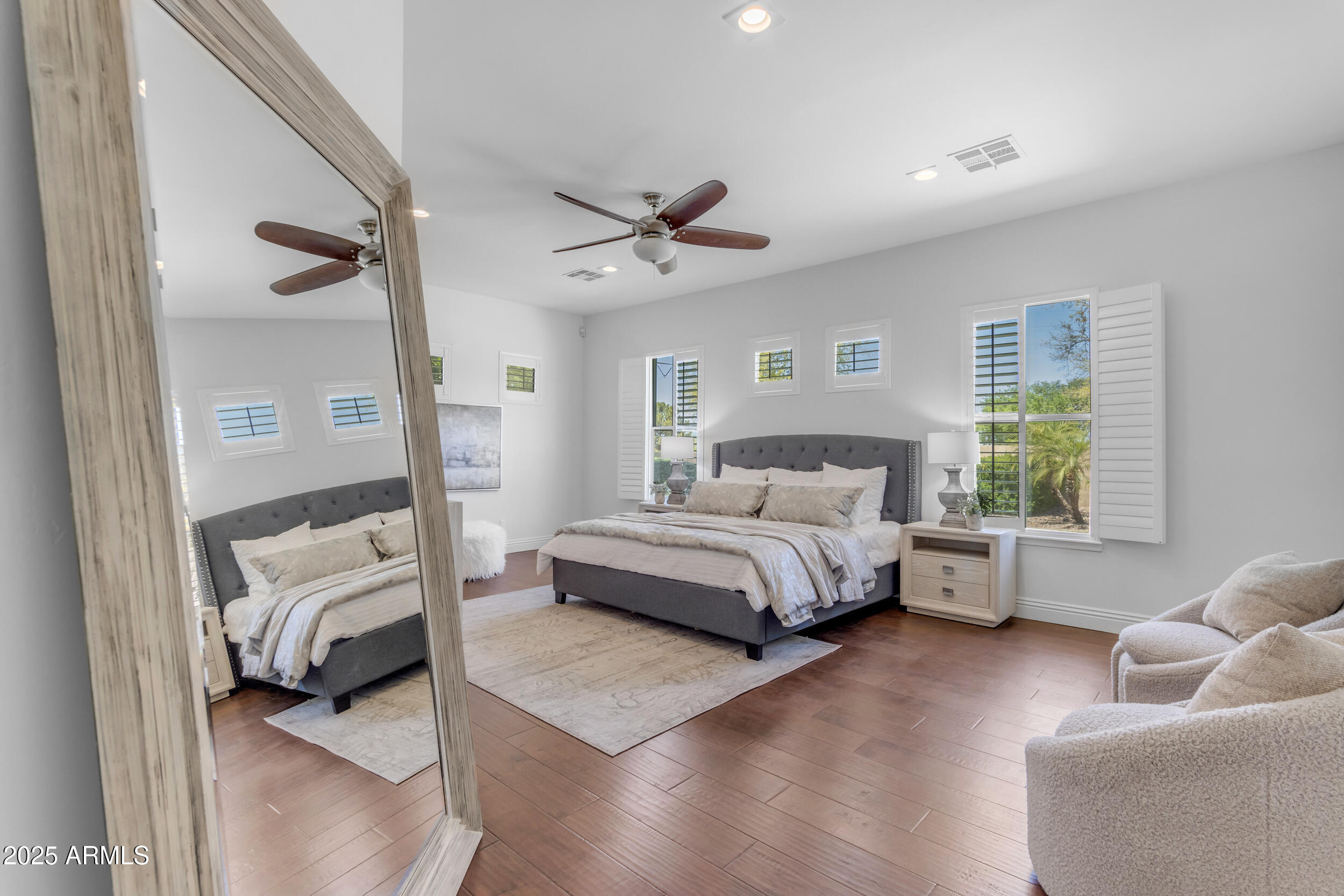 2820 Page Court Gilbert, AZ 85234 - Photo 42 of 109 a bedroom with a bed and a couch