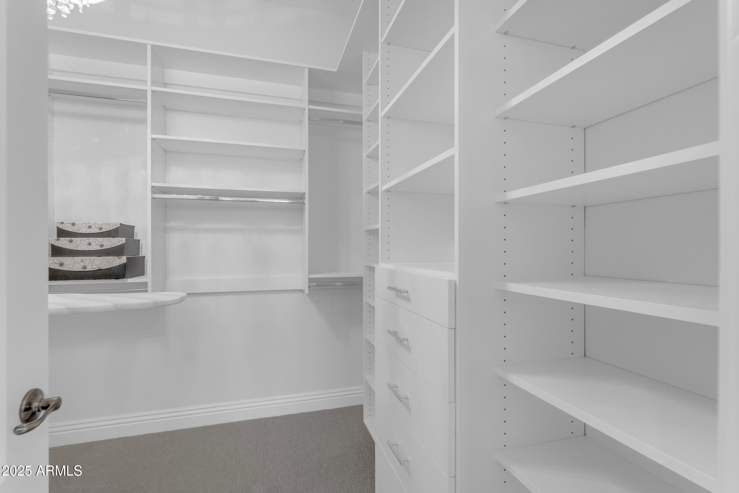 2820 Page Court Gilbert, AZ 85234 - Photo 49 of 109 a view of an empty walk in closet