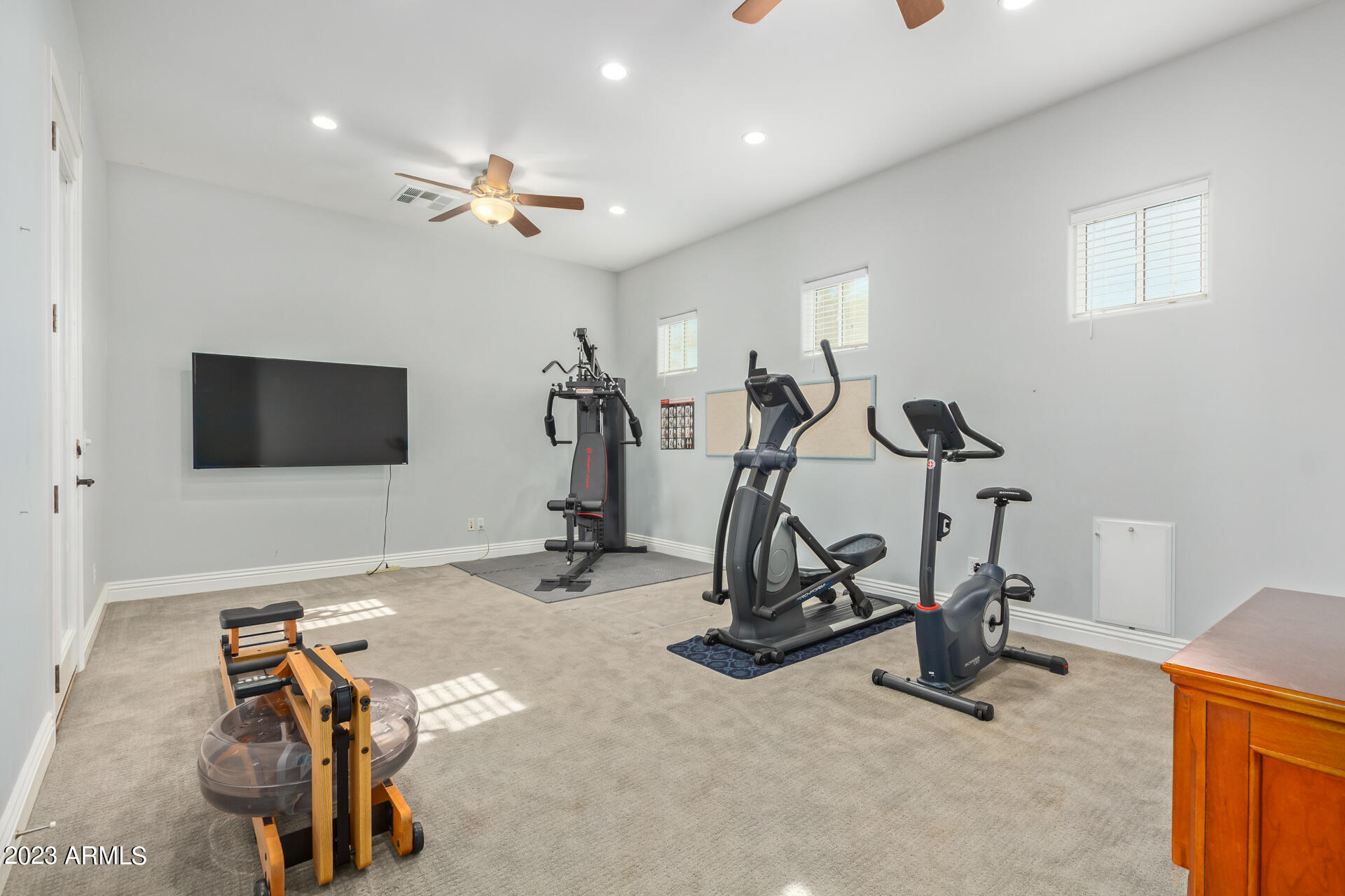 2820 Page Court Gilbert, AZ 85234 - Photo 53 of 109 a view of a room with gym equipment