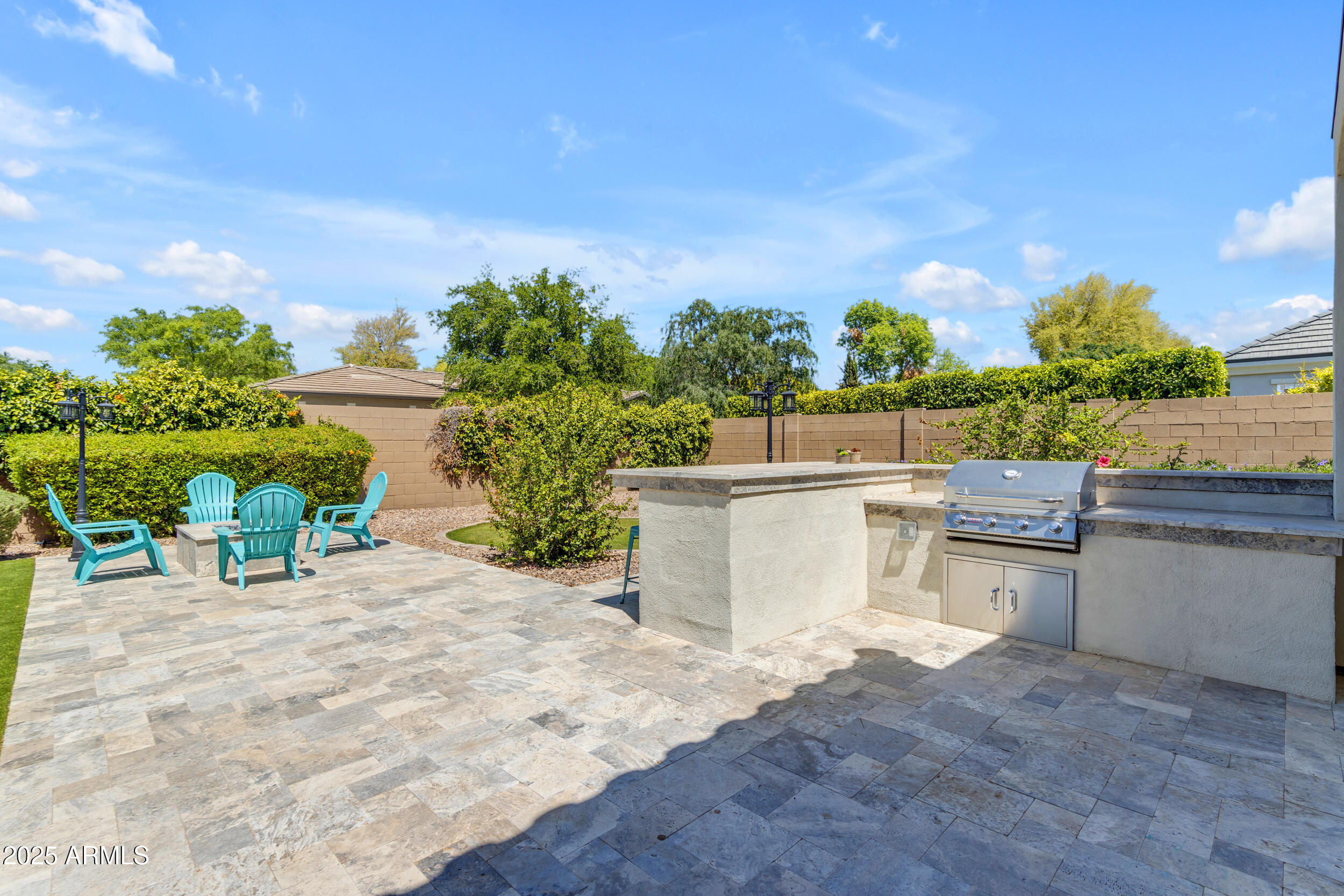 2820 Page Court Gilbert, AZ 85234 - Photo 72 of 109 a view of a outdoor kitchen with a sitting area
