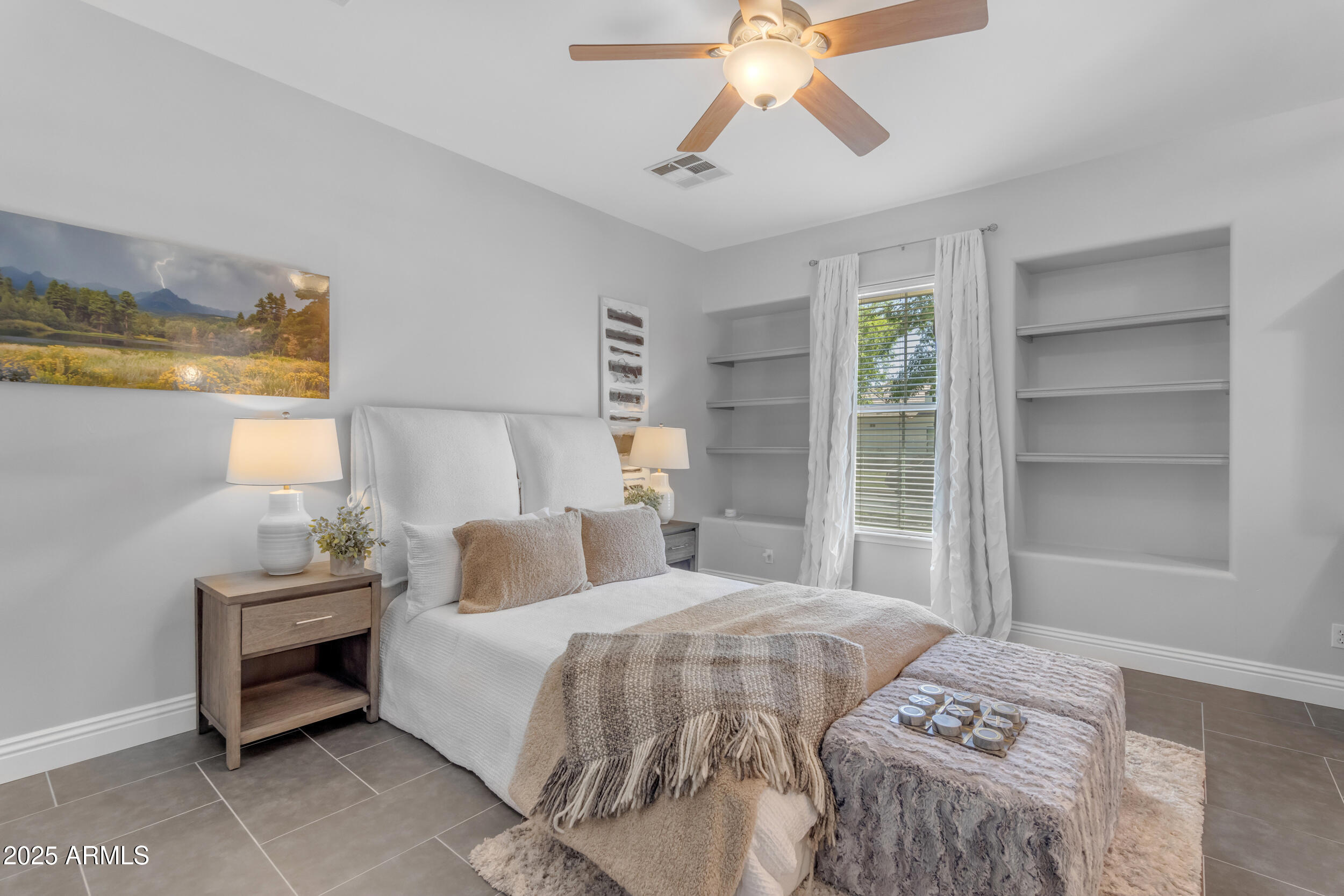 2820 Page Court Gilbert, AZ 85234 - Photo 87 of 109 a bedroom with a bed and a chandelier