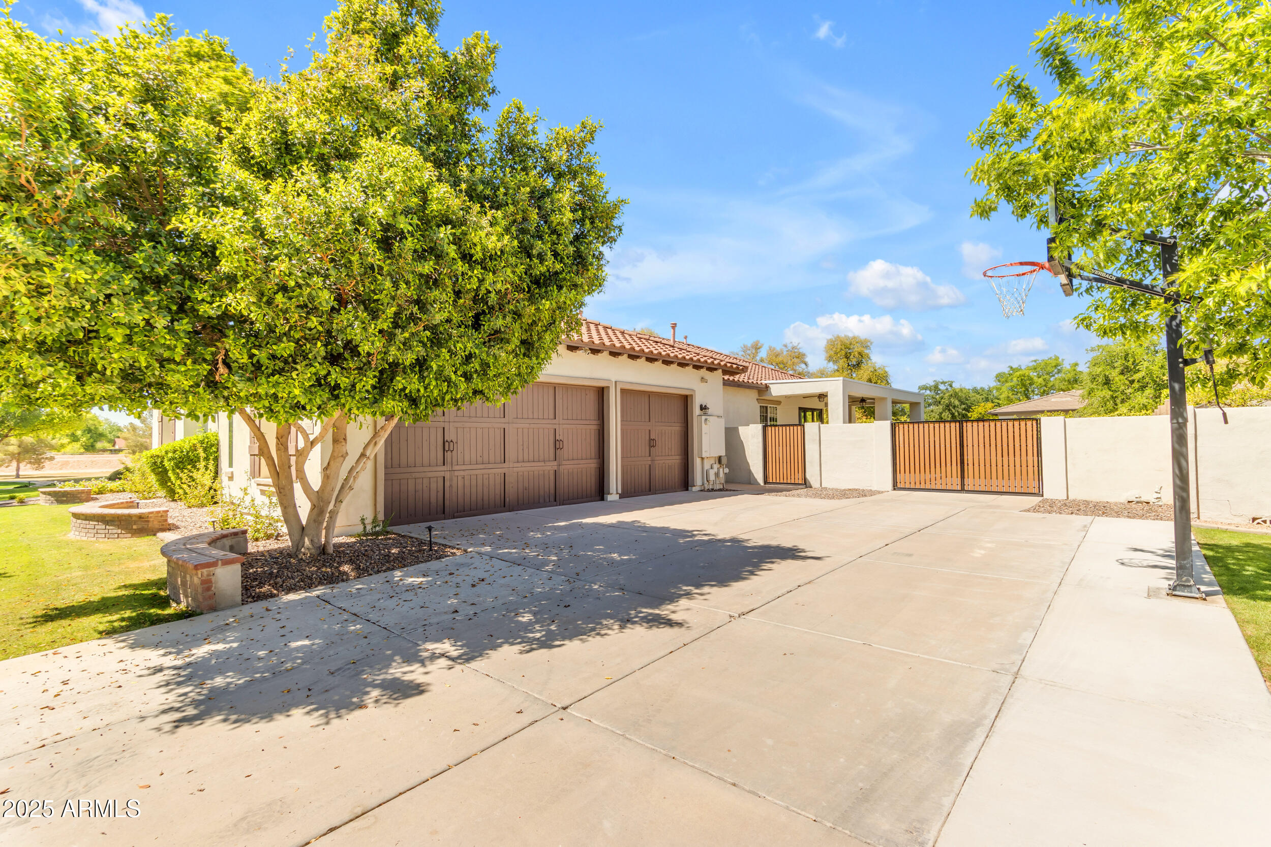 2820 Page Court Gilbert, AZ 85234 - Photo 91 of 109 a front view of a house with a yard and garage
