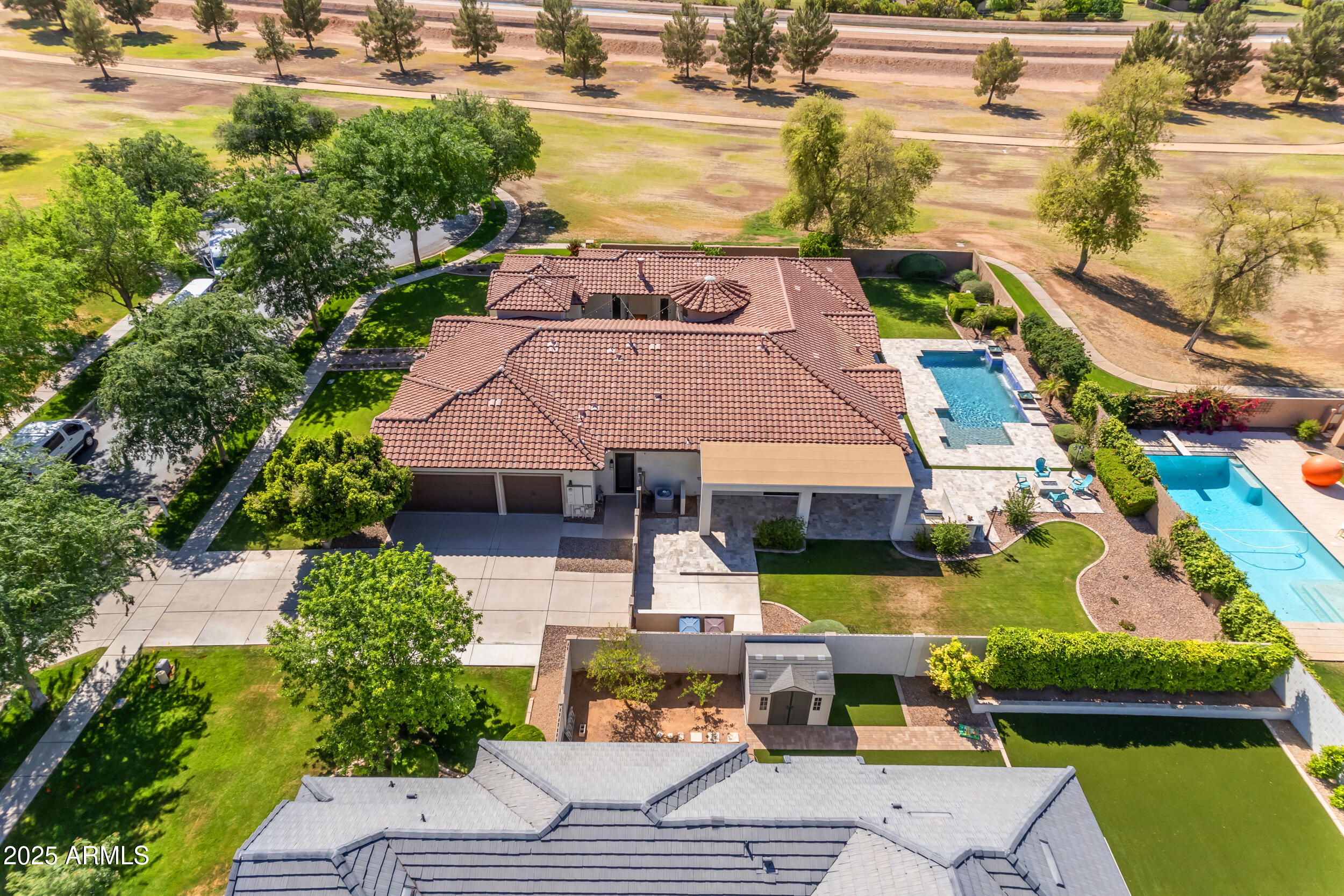 2820 Page Court Gilbert, AZ 85234 - Photo 94 of 109 an aerial view of a house with swimming pool and outdoor seating