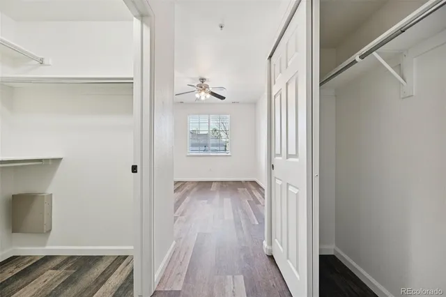 a view of livingroom with hardwood floor and hallway