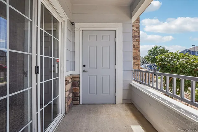 a view of balcony with small garden