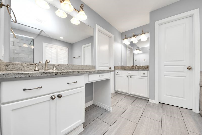 4222 Drake Street Houston, TX 77005 - Photo 25 of 28 a kitchen with a sink cabinets and window