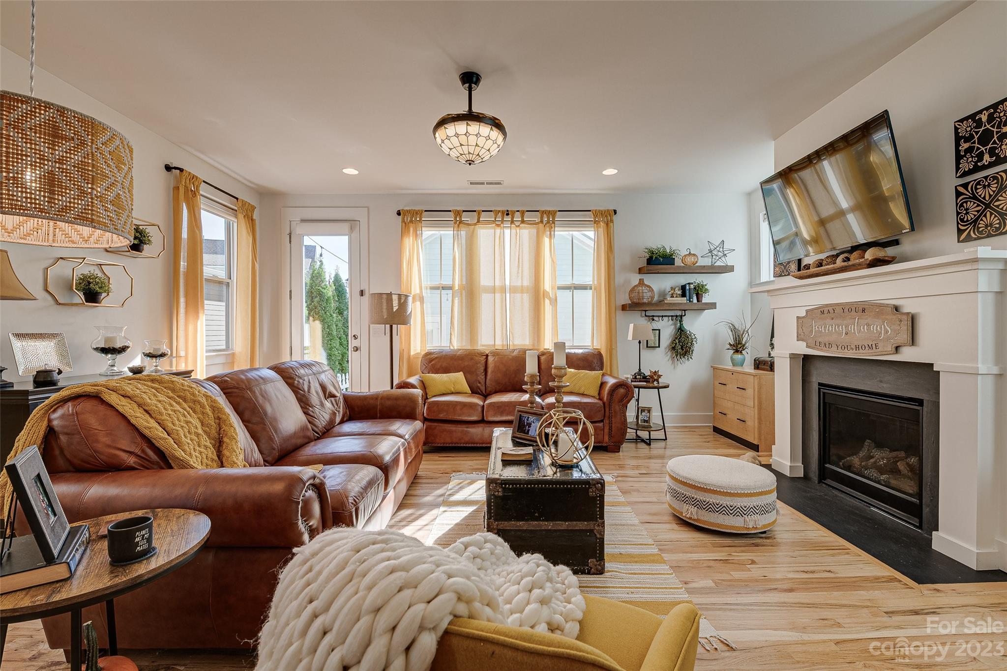 664 Bluff Loop Road Rock Hill, SC 29730 - Photo 12 of 26 a living room with furniture fireplace and flat screen tv