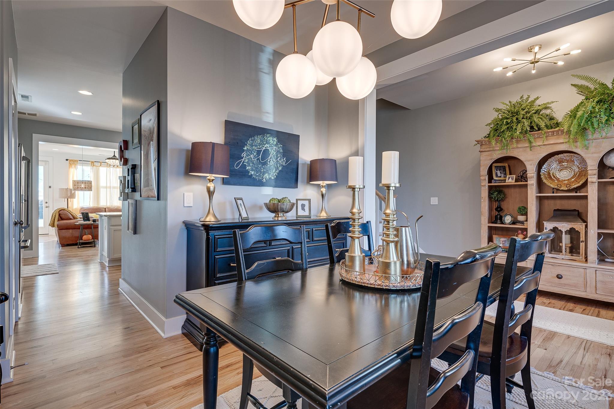 664 Bluff Loop Road Rock Hill, SC 29730 - Photo 5 of 26 a view of a dining room with furniture and wooden floor