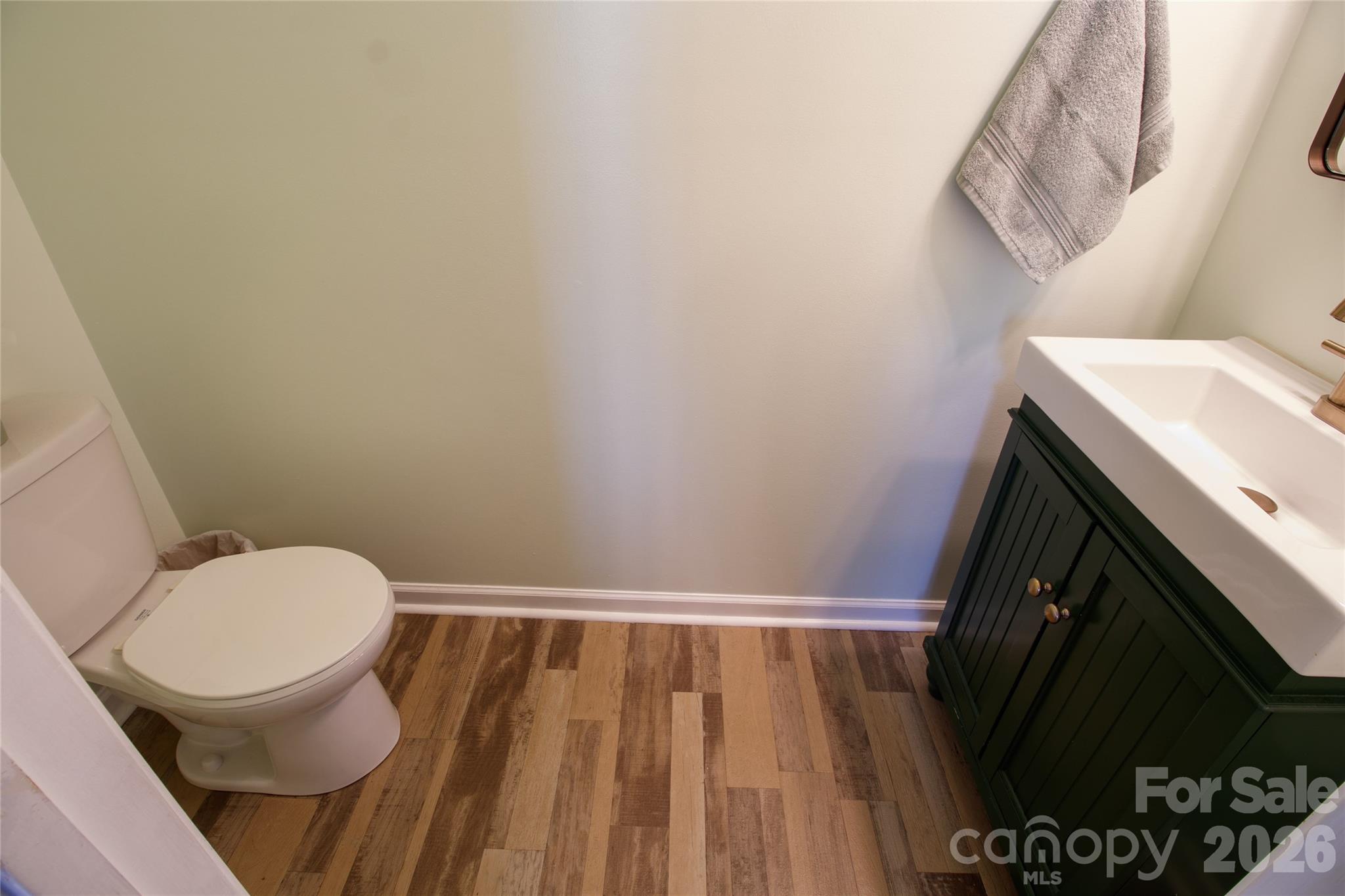 905 Alta Way Kannapolis, NC 28081 - Photo 11 of 24 a bathroom with a sink and a toilet