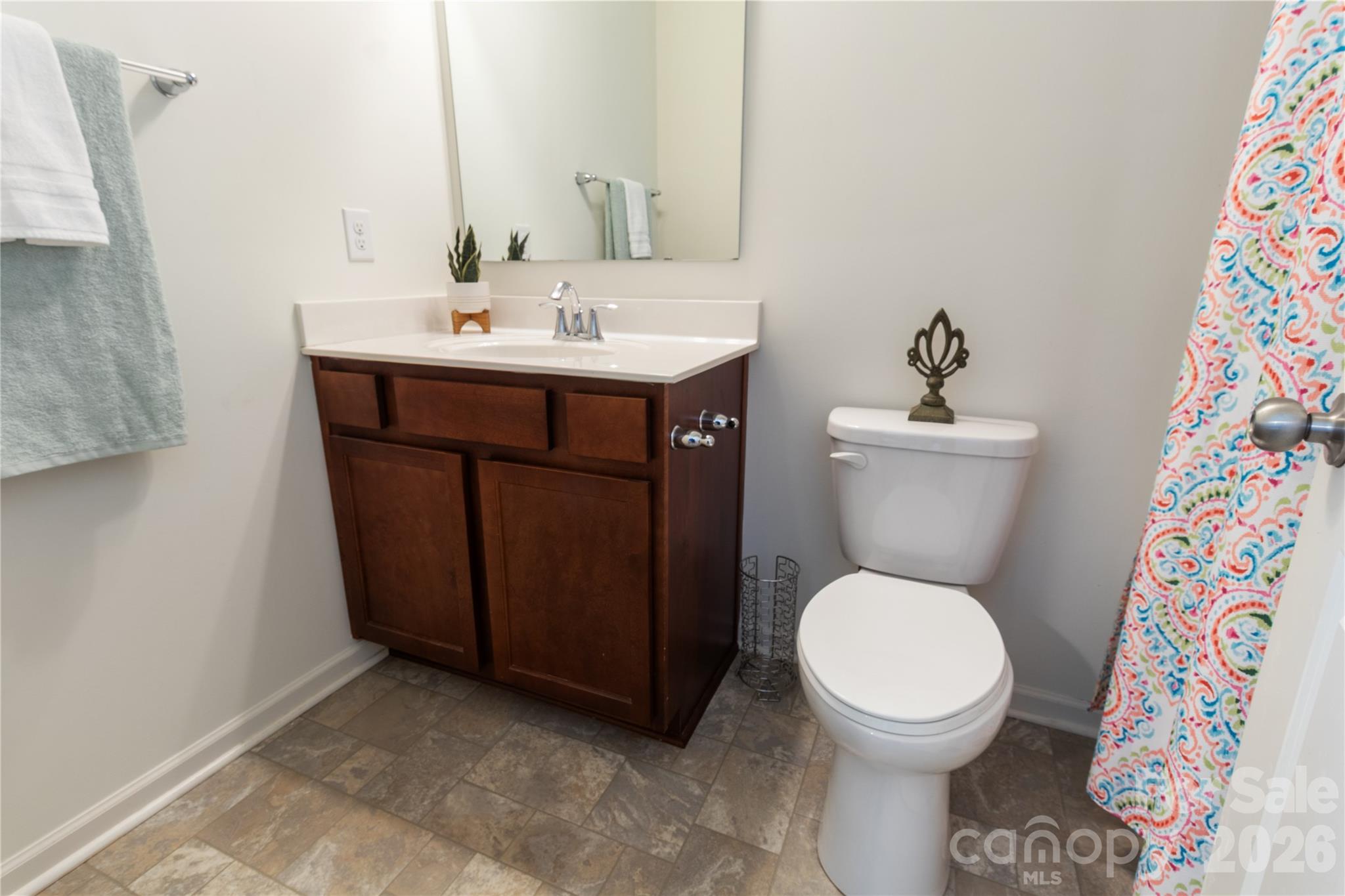 905 Alta Way Kannapolis, NC 28081 - Photo 14 of 24 a bathroom with a toilet sink and mirror