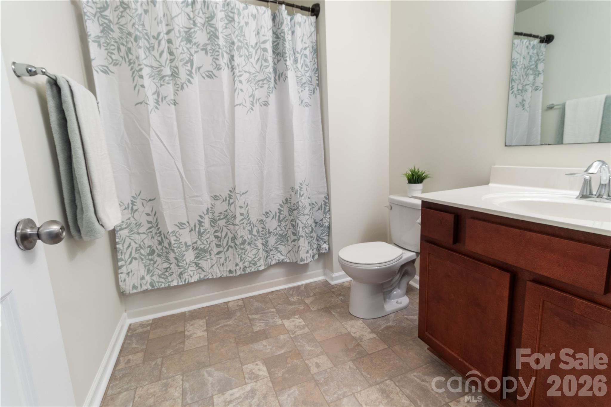 905 Alta Way Kannapolis, NC 28081 - Photo 18 of 24 a bathroom with a toilet sink and tub