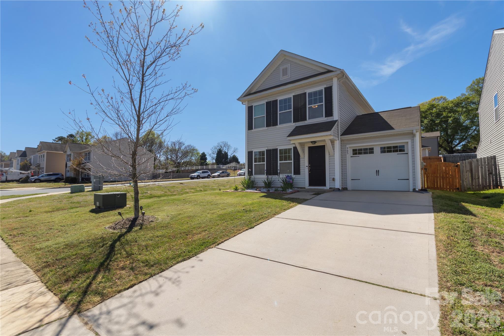 905 Alta Way Kannapolis, NC 28081 - Photo 2 of 24 a front view of a house with garden