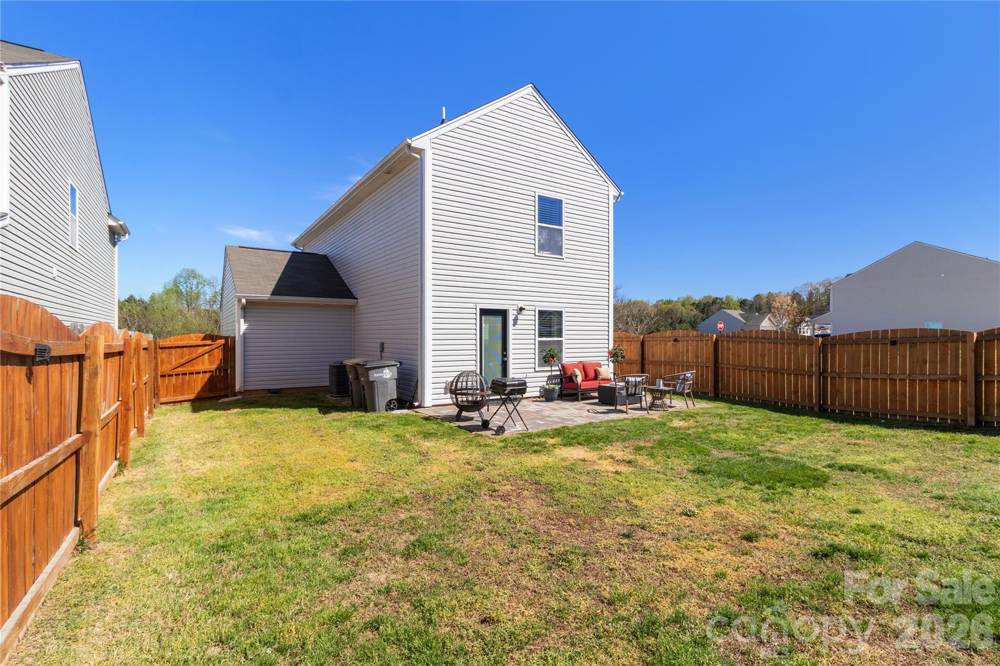 905 Alta Way Kannapolis, NC 28081 - Photo 22 of 24 a view of a house with backyard and sitting area