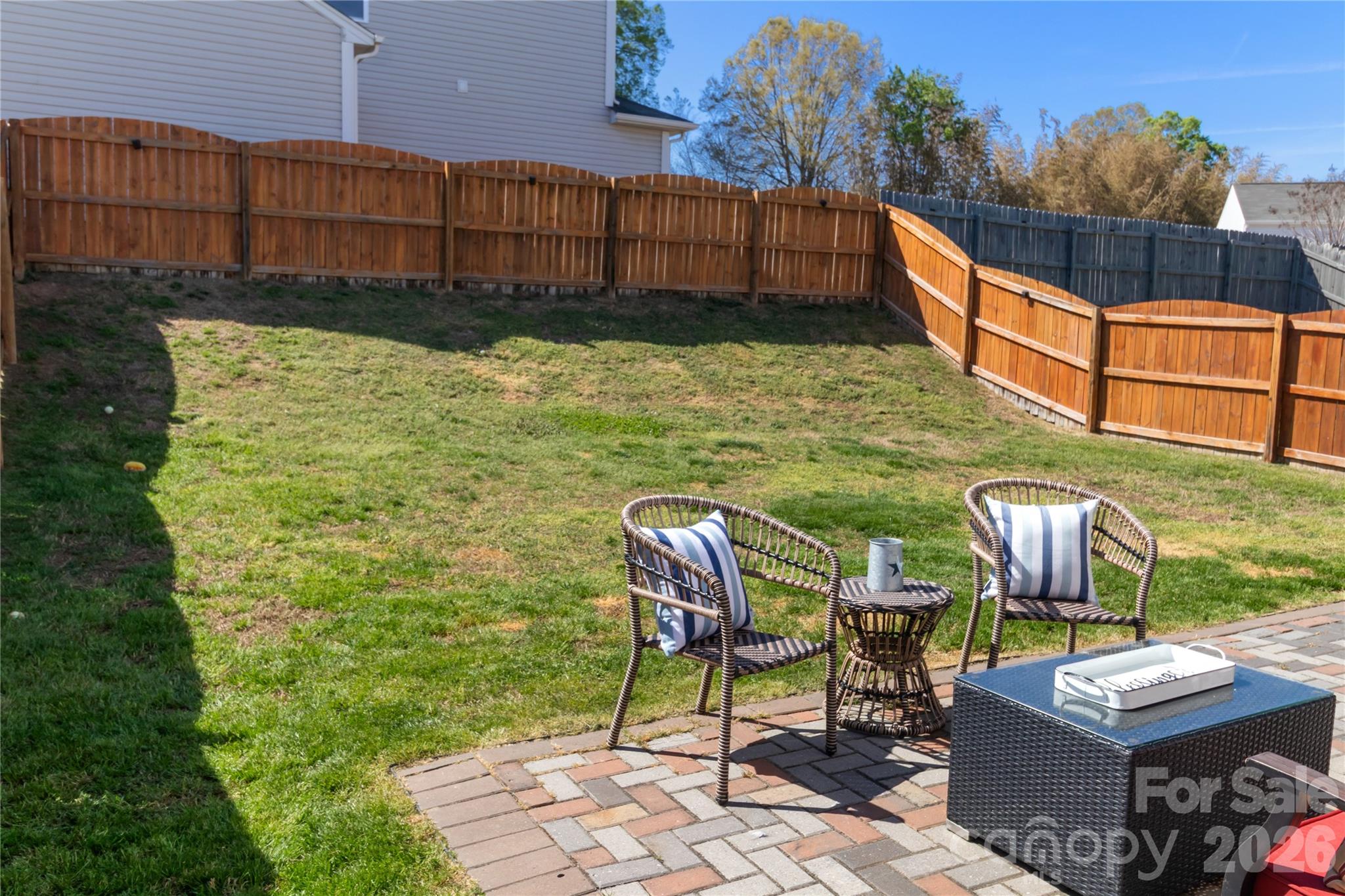 905 Alta Way Kannapolis, NC 28081 - Photo 23 of 24 a view of a chairs and table in the backyard