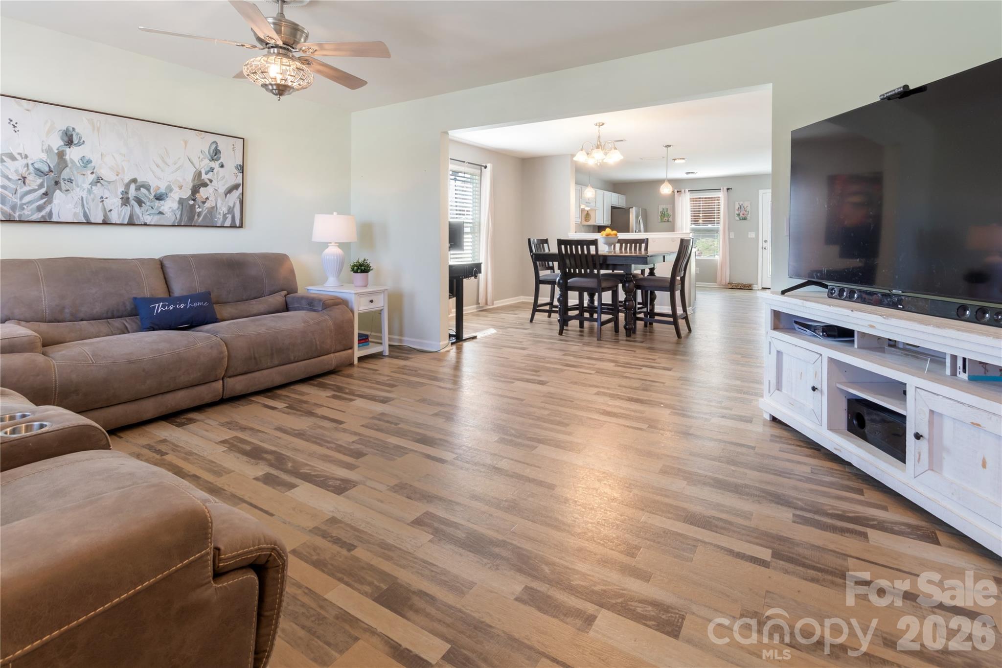 905 Alta Way Kannapolis, NC 28081 - Photo 4 of 24 a living room with furniture and a flat screen tv